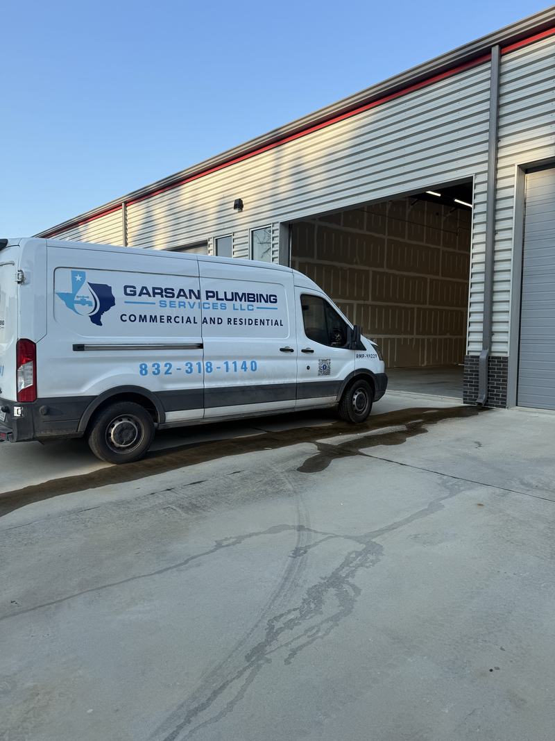 GarSan Plumbing Services work van on a job site